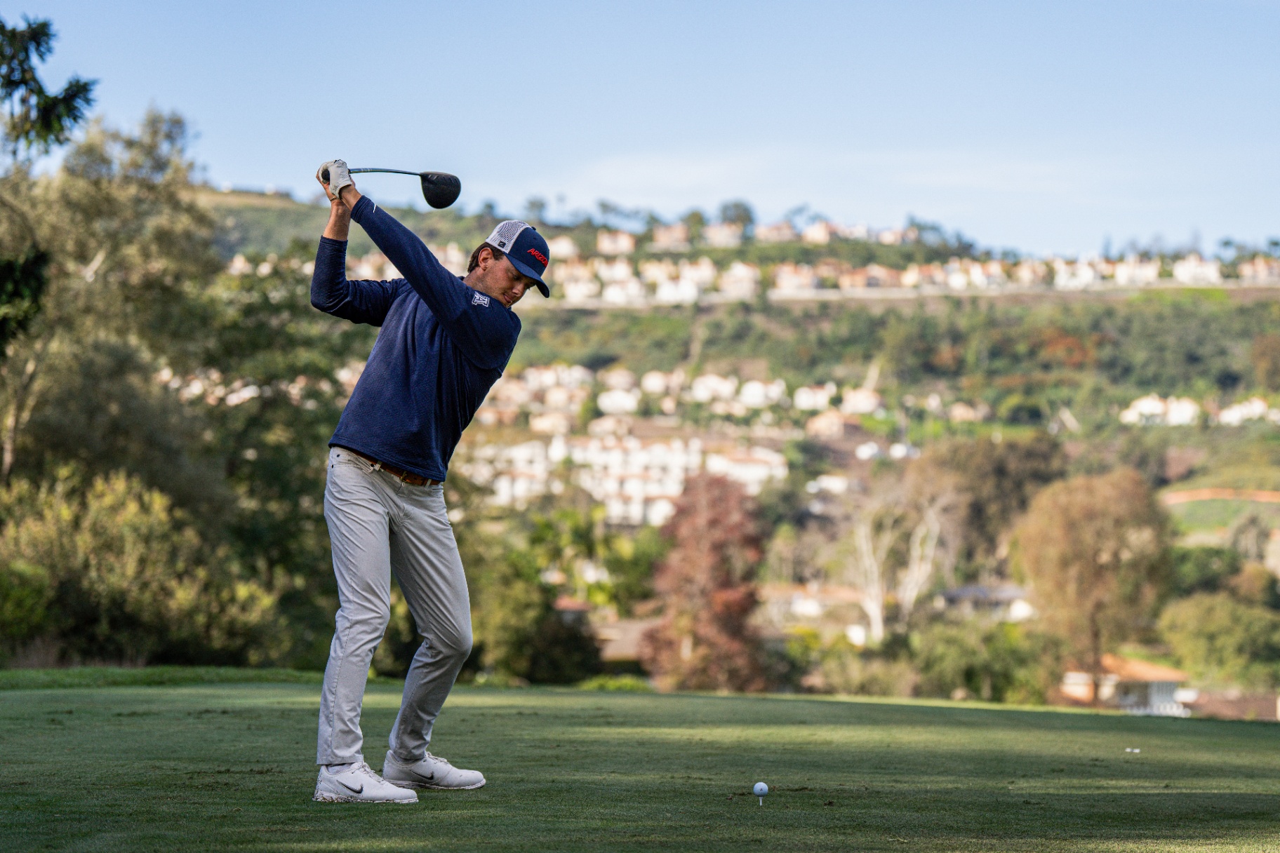 Connor Hamm at the top of his backswing on the tee